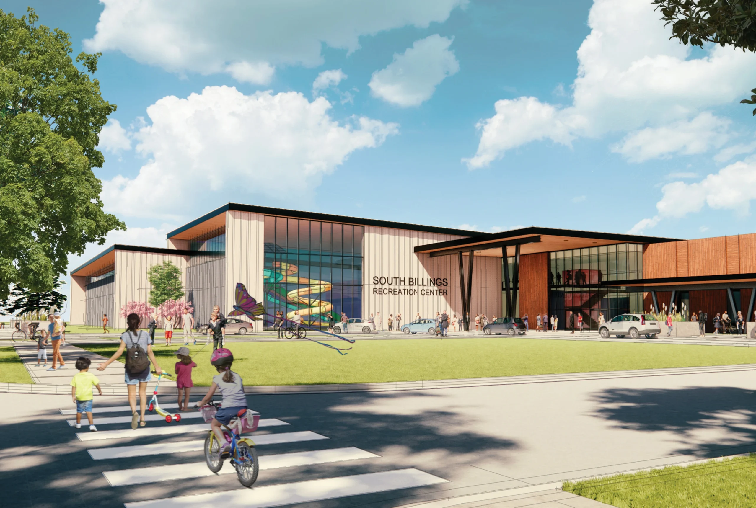 Exterior rendering of the South Billings Recreation Center, a dynamic multi-use facility featuring expansive glass windows, wood accents, and outdoor gathering spaces designed for community engagement.