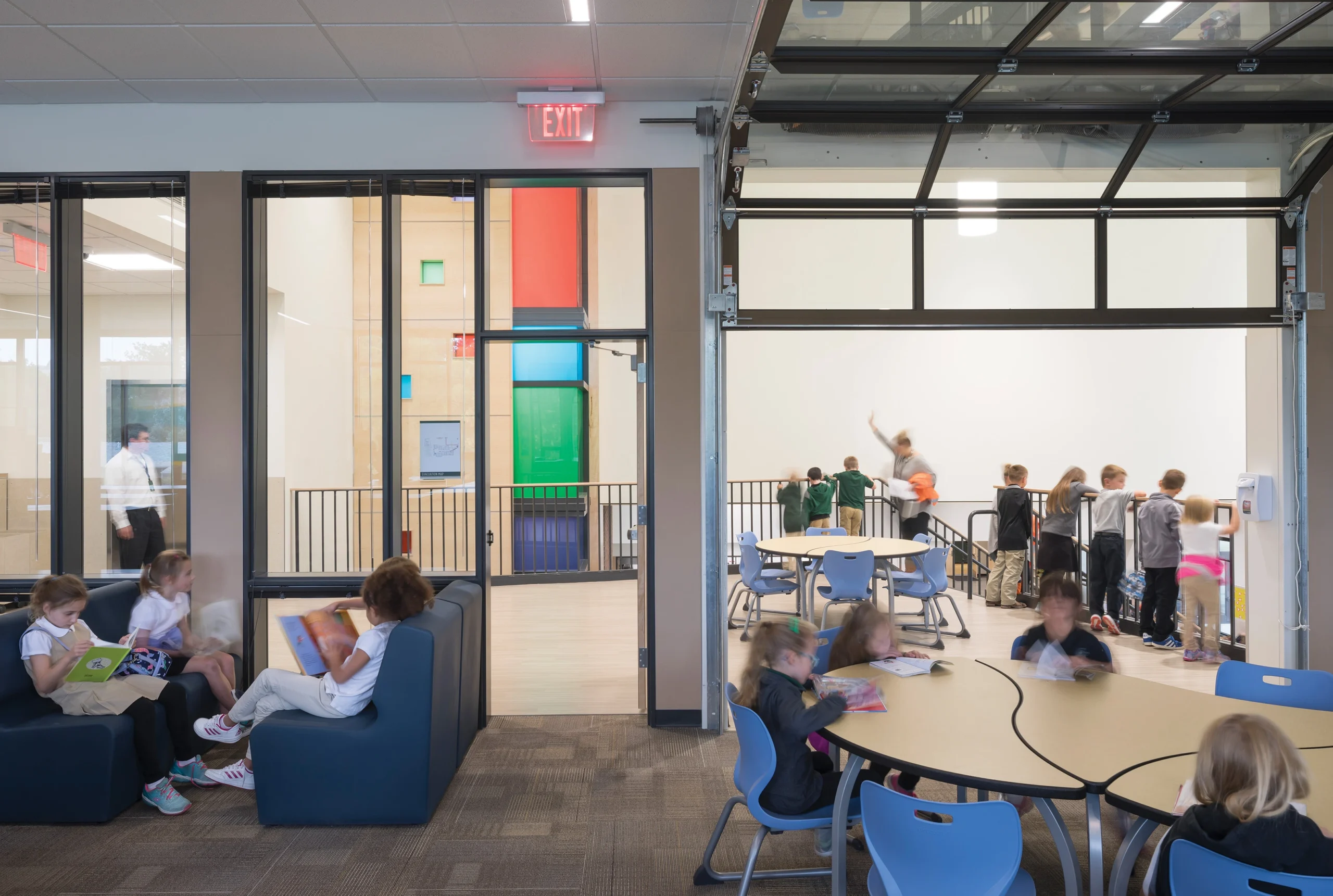 A collaborative learning space at St. Francis K-8 School features flexible seating, reading areas, and an open design that encourages interaction and engagement.