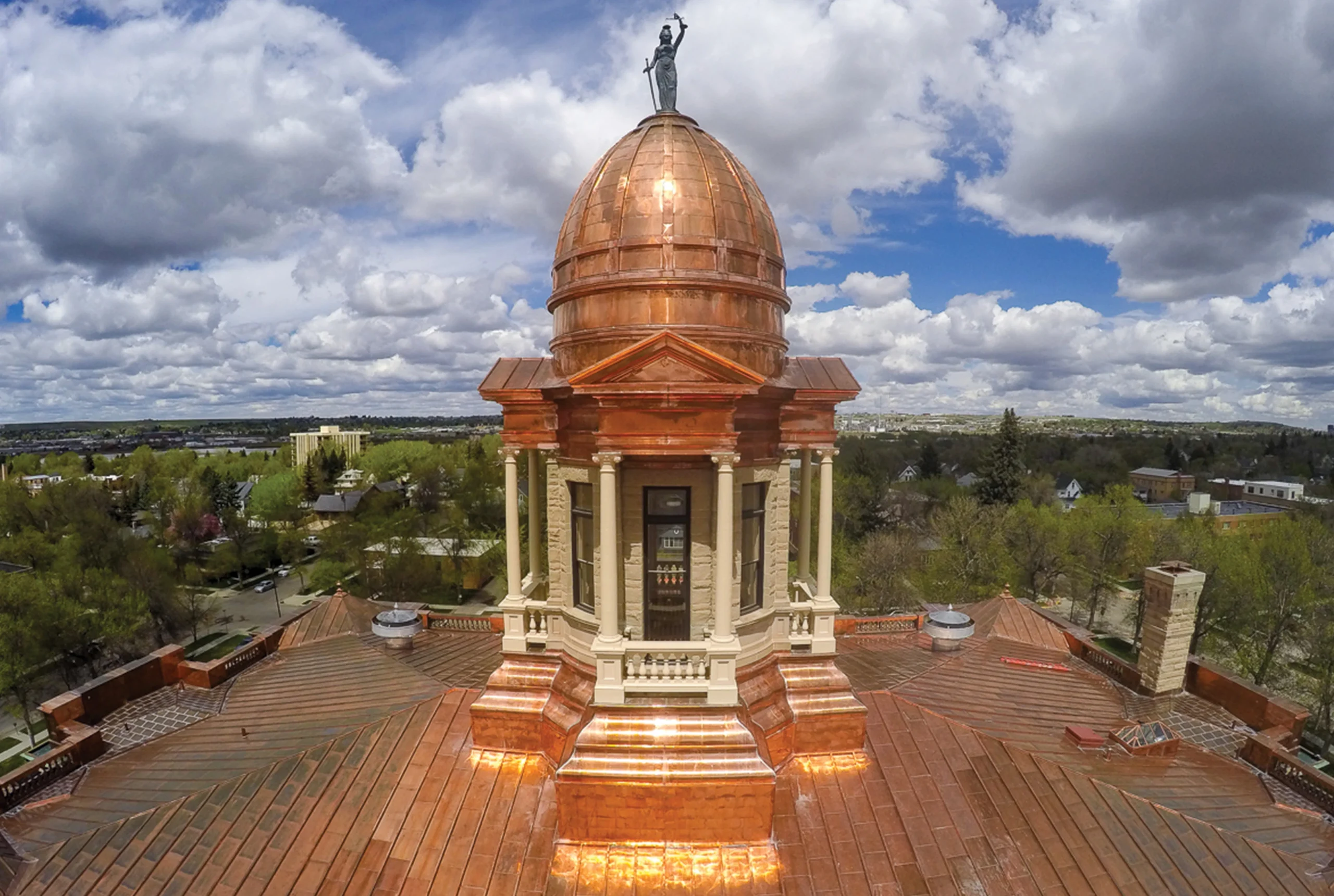 Restored copper dome of the Cascade County Courthouse, showcasing meticulous craftsmanship and preservation of the 1903 English Renaissance Revival architecture. The dome and copper roof overhaul ensure durability while maintaining the building’s historic integrity.